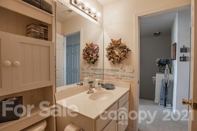 923 Azurine Circle Fort Mill, SC 29708 - Photo 31 of 32 a bathroom with a sink mirror and vanity