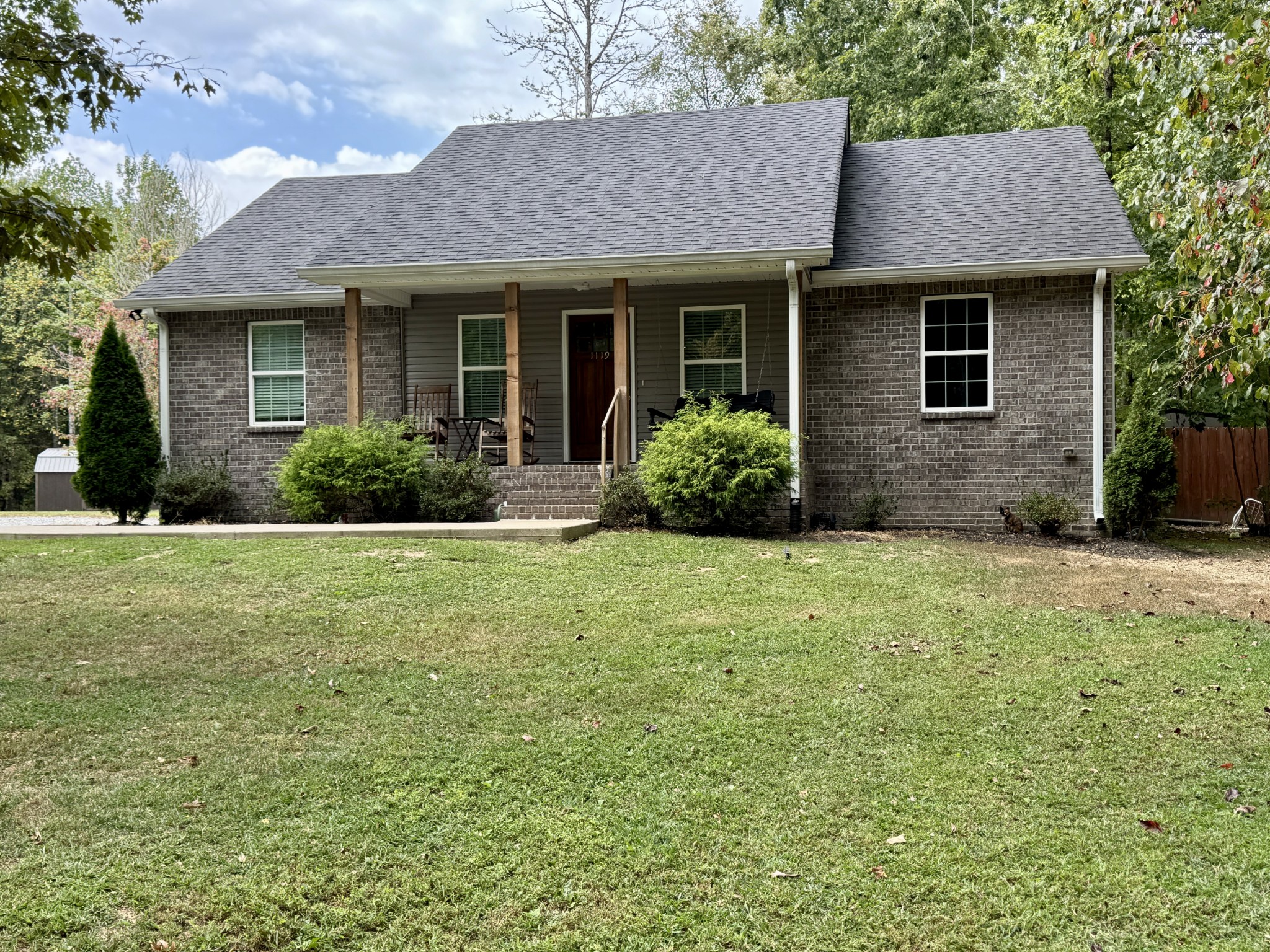 1119 Smiley Troutt Road Bethpage, TN 37022 - Photo 1 of 21 a front view of a house with garden