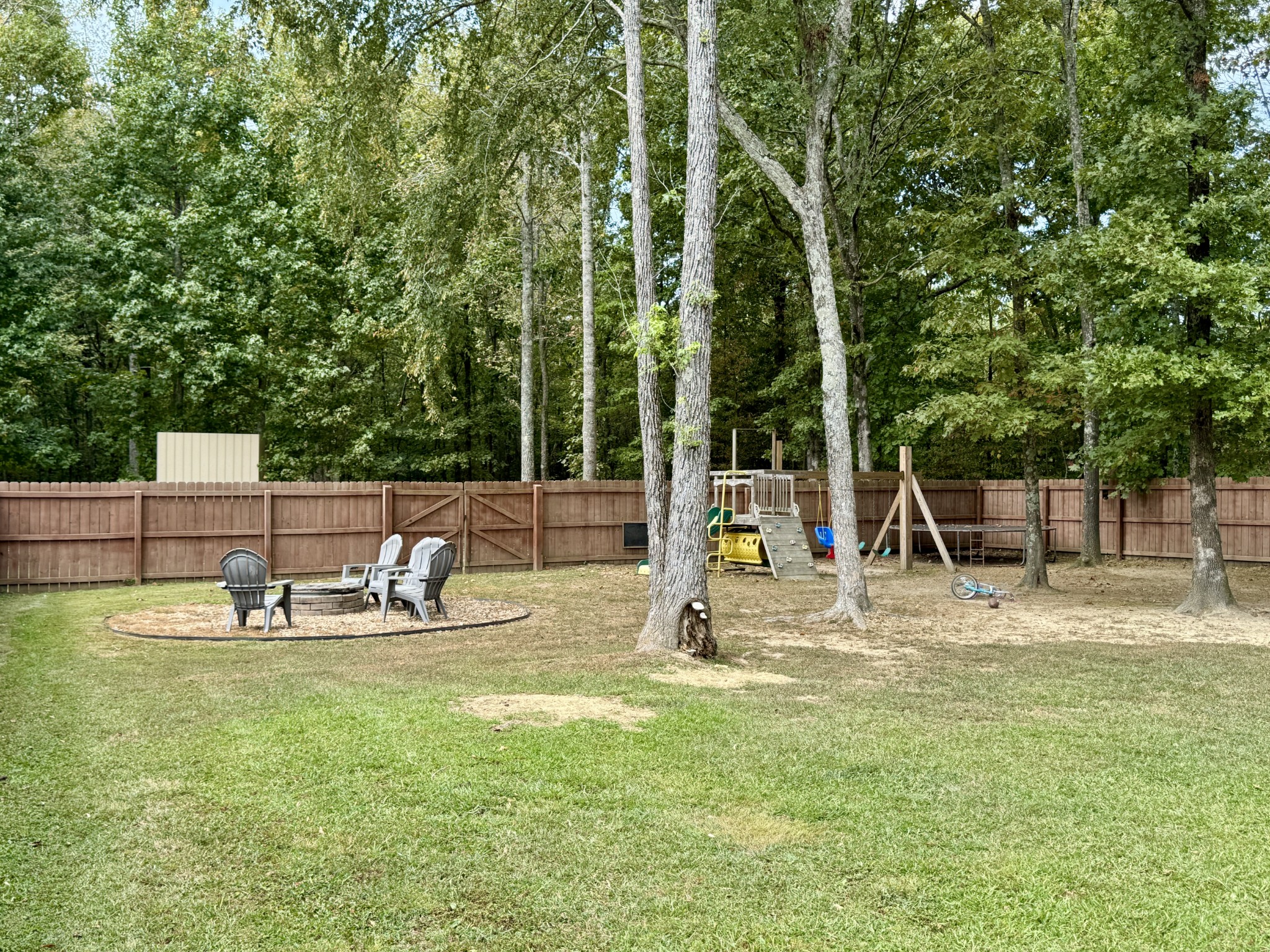 1119 Smiley Troutt Road Bethpage, TN 37022 - Photo 16 of 21 a swimming pool with lots of tress in front of it
