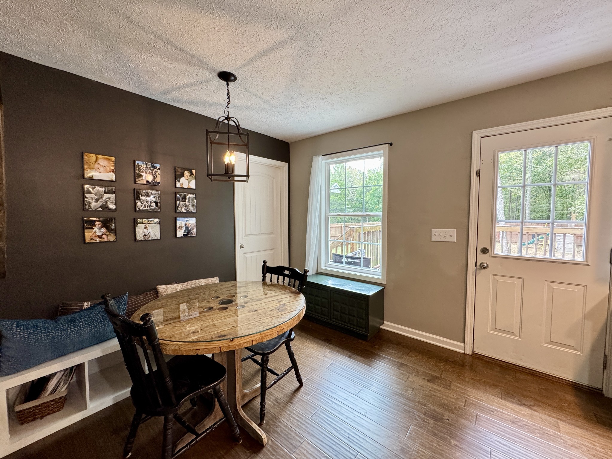 1119 Smiley Troutt Road Bethpage, TN 37022 - Photo 7 of 21 a view of a dining room with furniture window and wooden floor