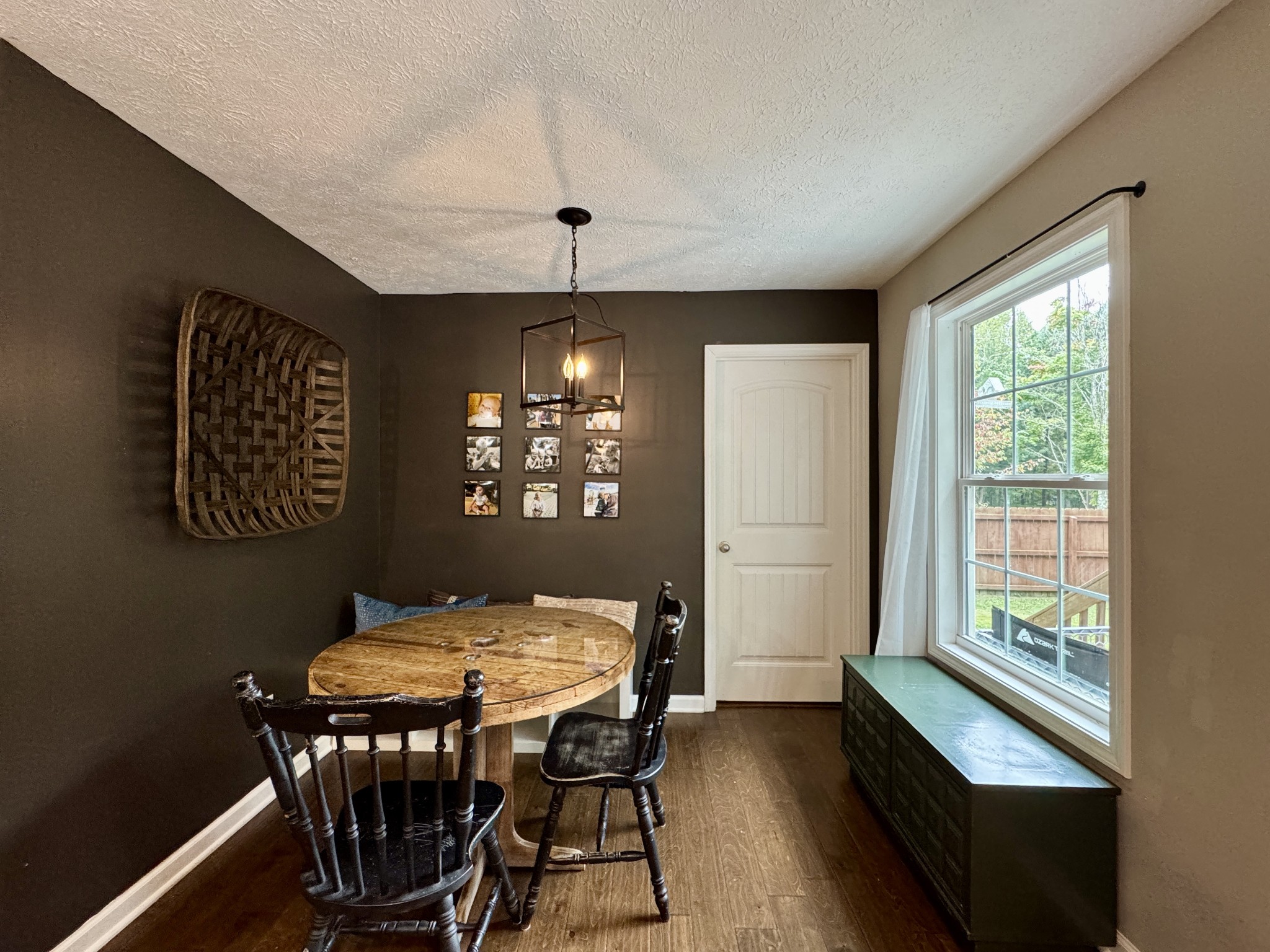 1119 Smiley Troutt Road Bethpage, TN 37022 - Photo 8 of 21 a view of a dining room with furniture window and wooden floor