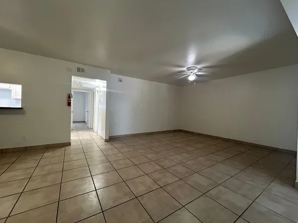 a view of a livingroom and entryway