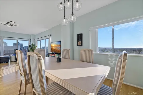 an aerial view of residential houses and wooden fence