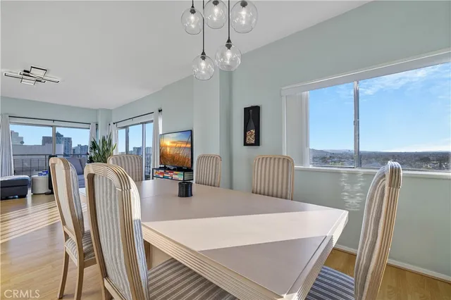 an aerial view of residential houses and wooden fence