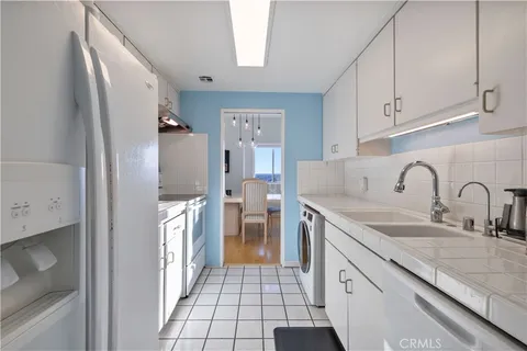 a view of a balcony with furniture