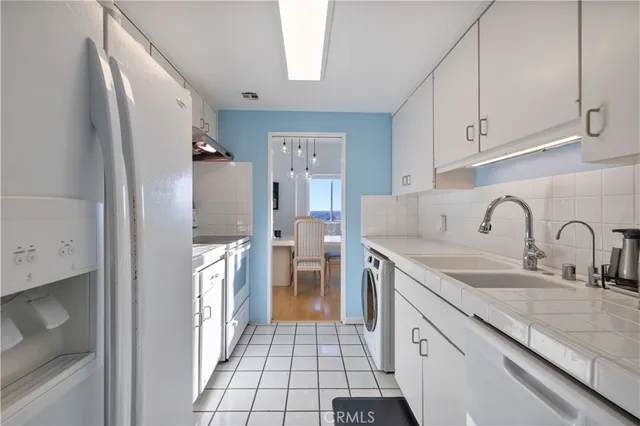 a view of a balcony with furniture