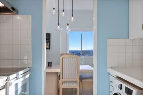 a view of a balcony with furniture