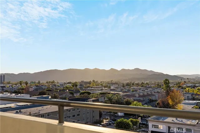 a view of a balcony with furniture