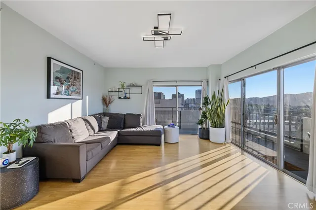 a living room with furniture and a table