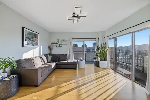 a living room with furniture and a table