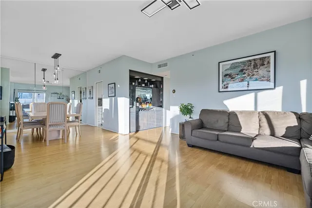 a kitchen with granite countertop a white stove top oven sink and cabinets