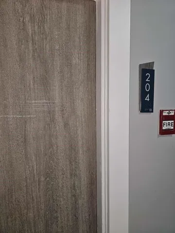 a front view of a building with street view