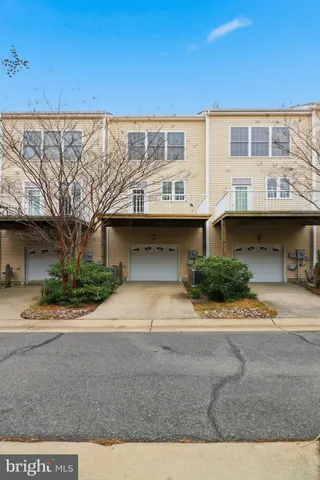 front view of a house with a garden