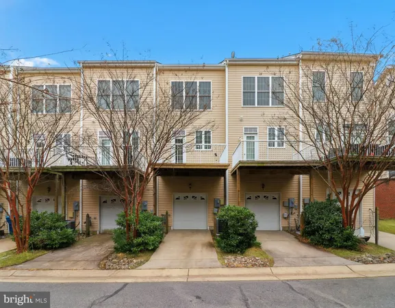 a spacious bedroom with a bed and a couch