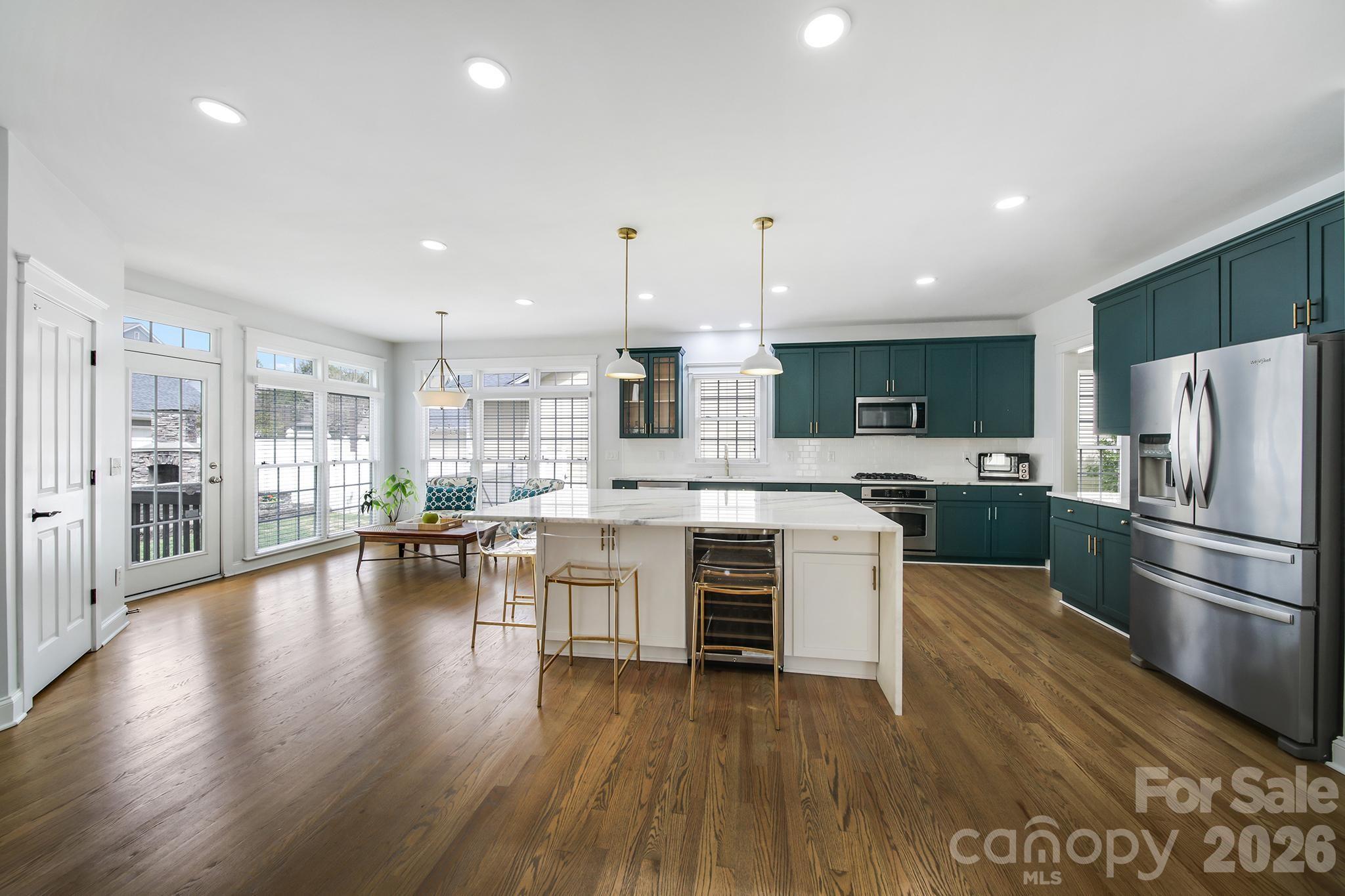 882 Promenade Walk Fort Mill, SC 29708 - Photo 11 of 48 a kitchen with a sink appliances and cabinets