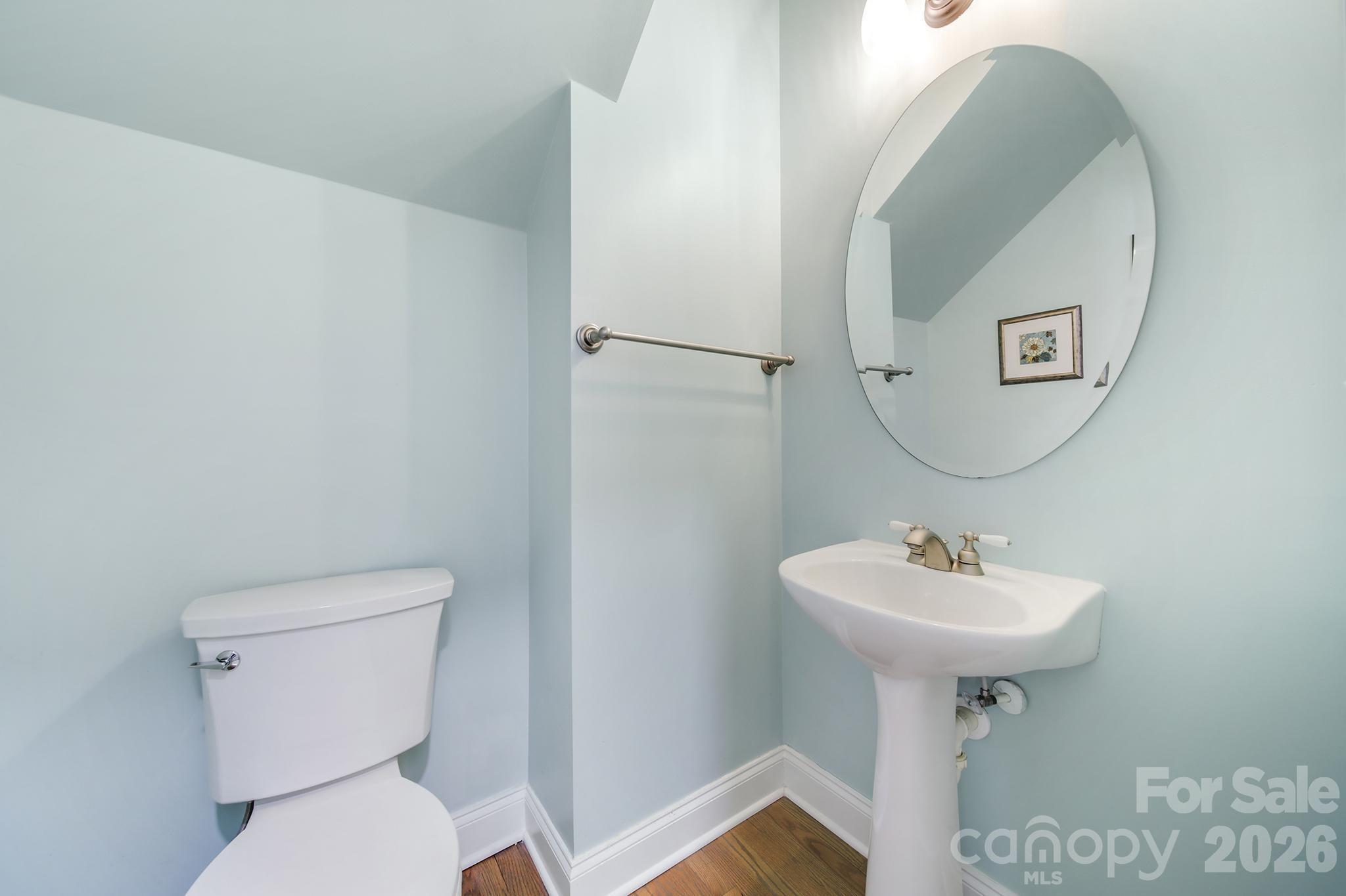882 Promenade Walk Fort Mill, SC 29708 - Photo 18 of 48 a bathroom with a sink a toilet and mirror