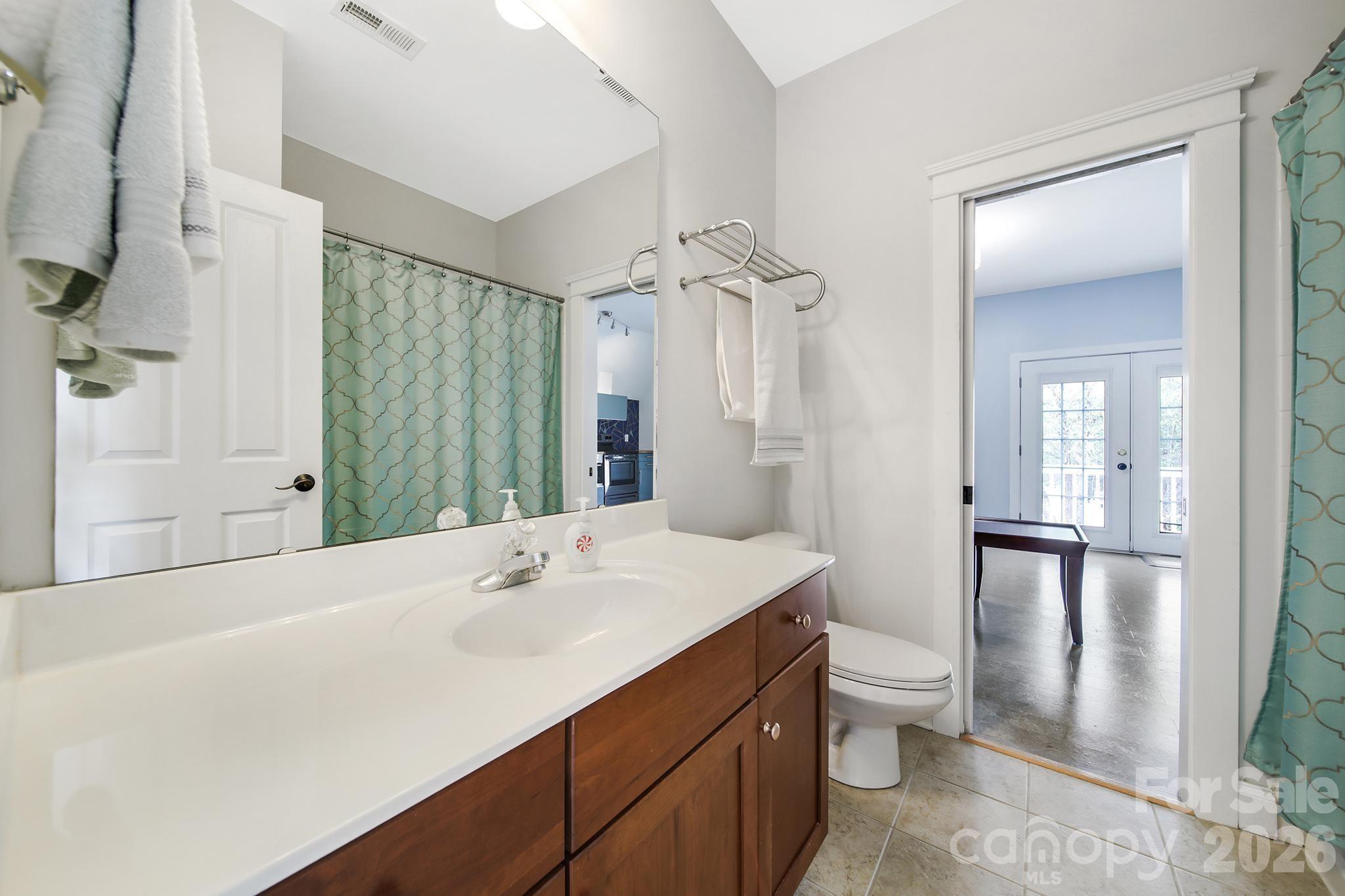 882 Promenade Walk Fort Mill, SC 29708 - Photo 24 of 48 a bathroom with a sink a toilet and shower