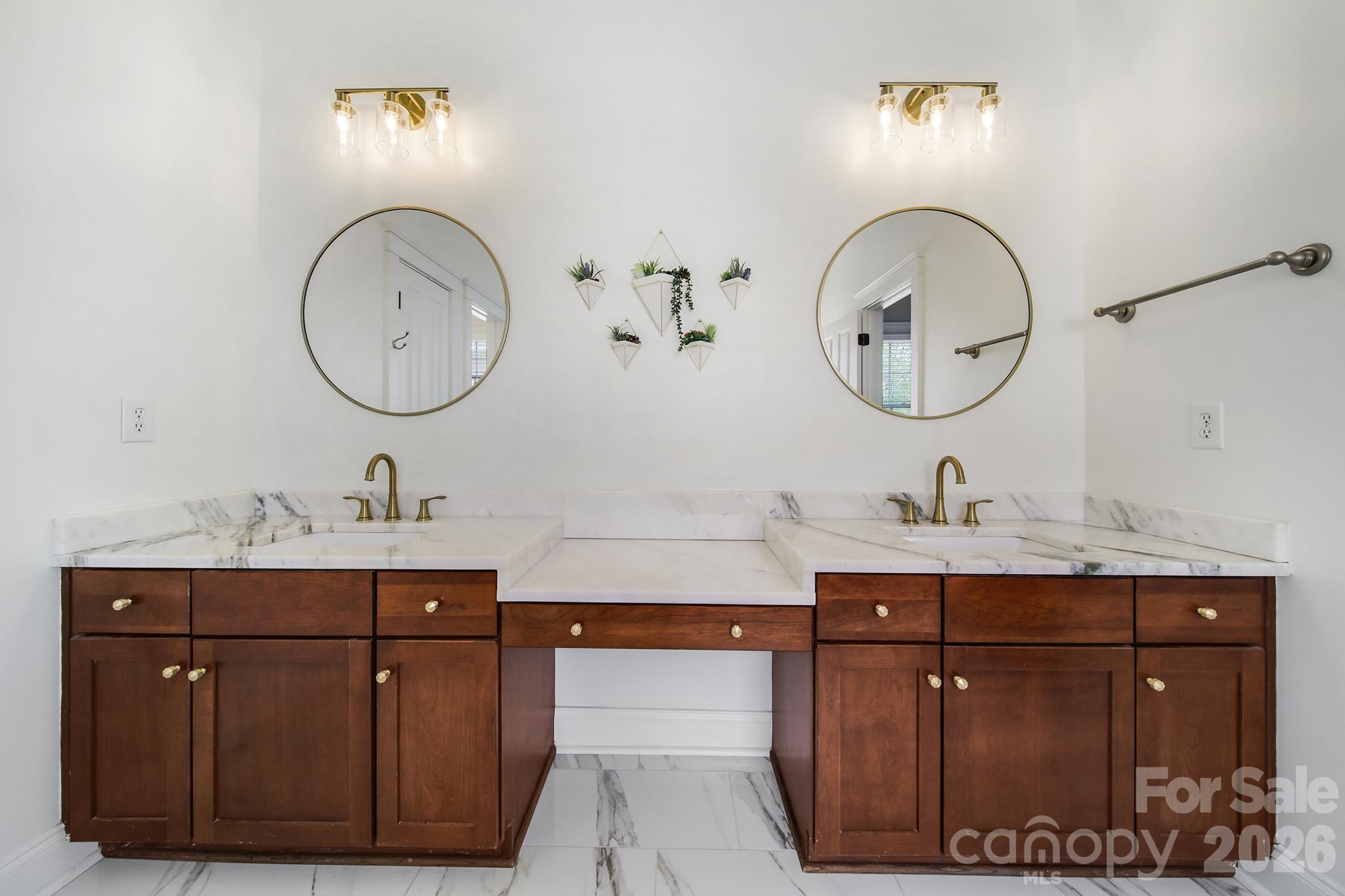 882 Promenade Walk Fort Mill, SC 29708 - Photo 28 of 48 a bathroom with a sink vanity and a mirror