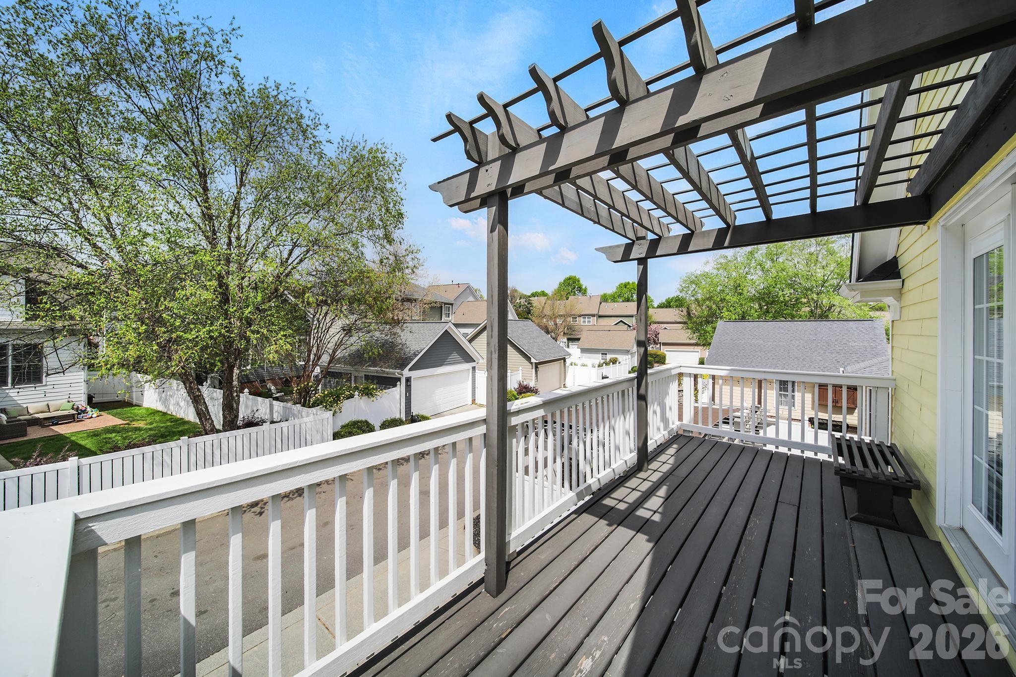 882 Promenade Walk Fort Mill, SC 29708 - Photo 34 of 48 a view of a wooden chairs on the roof deck
