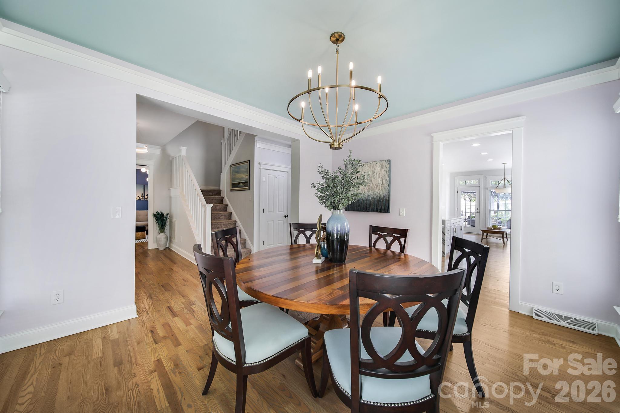882 Promenade Walk Fort Mill, SC 29708 - Photo 5 of 48 a view of a dining room with furniture and wooden floor