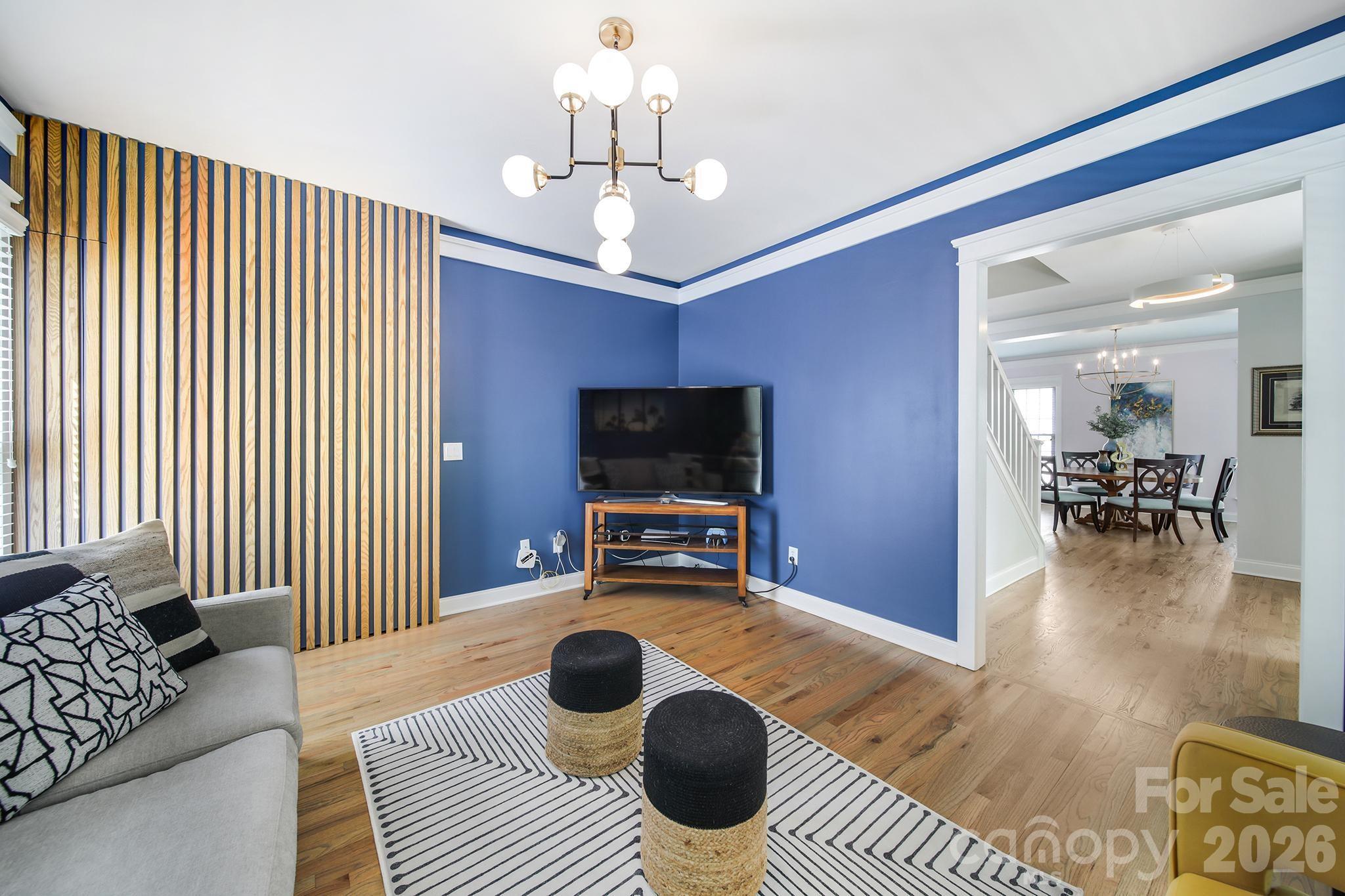 882 Promenade Walk Fort Mill, SC 29708 - Photo 7 of 48 a living room with furniture and a flat screen tv