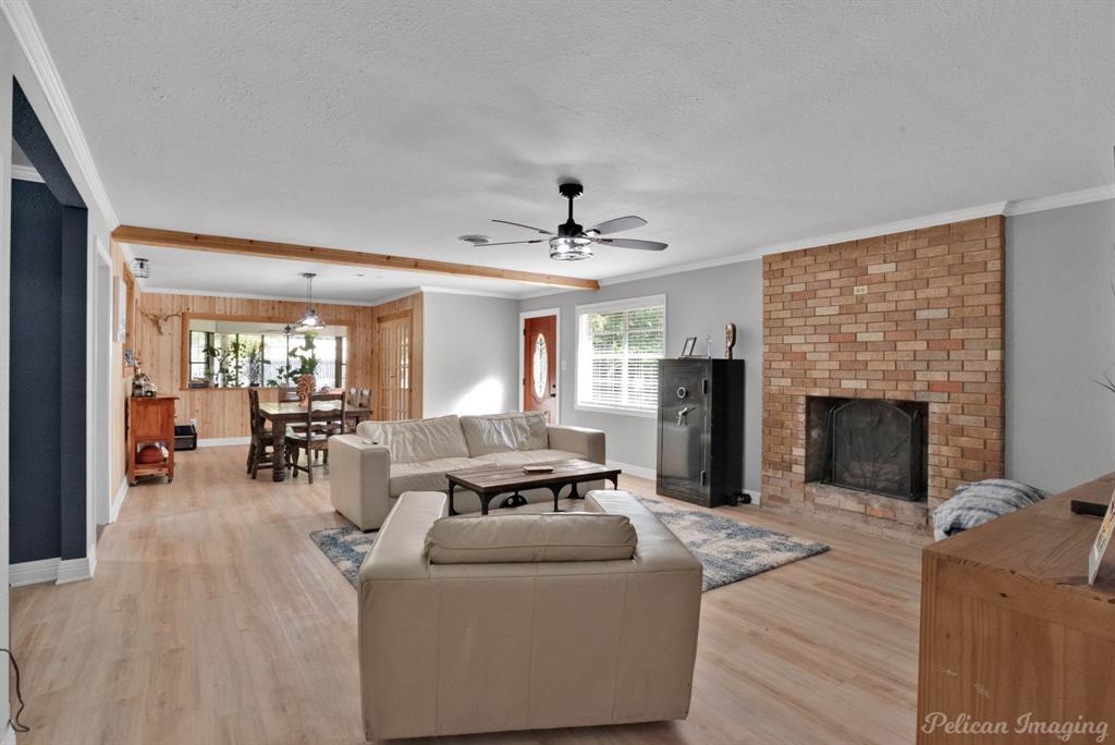 1100 Chipper Lane Keithville, LA 71047 - Photo 5 of 28 a living room with furniture and a fireplace