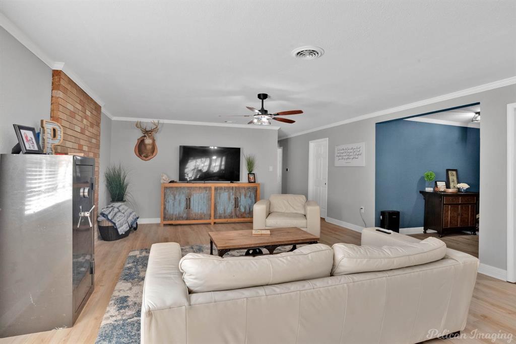 1100 Chipper Lane Keithville, LA 71047 - Photo 6 of 28 a living room with furniture and a flat screen tv