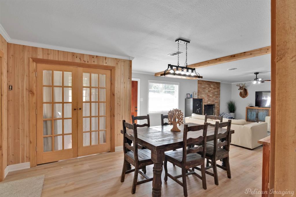 1100 Chipper Lane Keithville, LA 71047 - Photo 9 of 28 a view of a dining room with furniture window and wooden floor