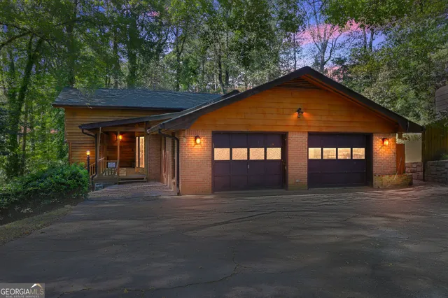a front view of a house with yard