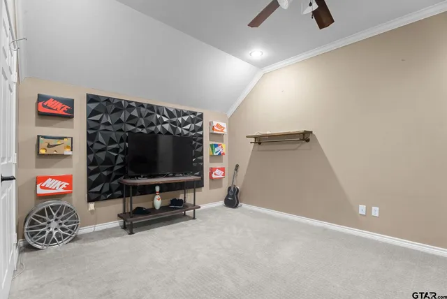 wooden floor and flat screen tv in a room