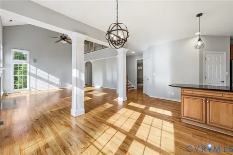 a kitchen with stainless steel appliances granite countertop a stove top oven a sink with granite countertops and cabinets