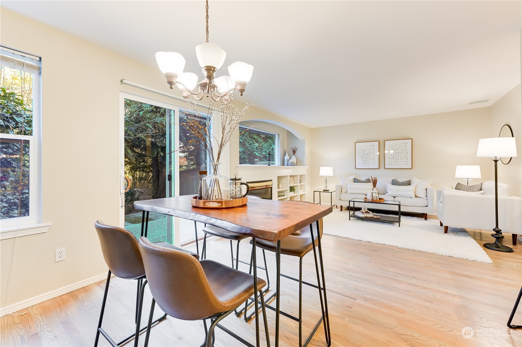 2201 192nd Street Southeast, Unit C3 Bothell, WA 98012 - Photo 11 of 26 a view of a dining room with furniture a chandelier and wooden floor