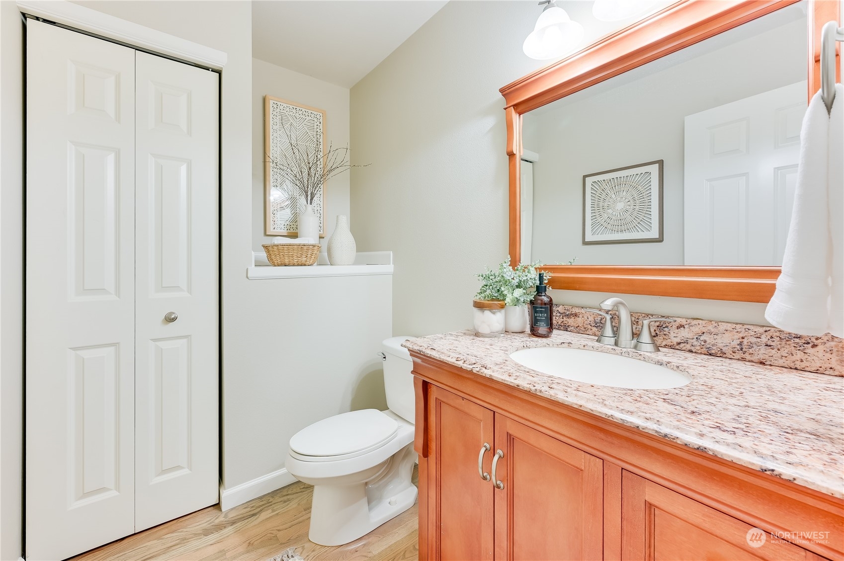 2201 192nd Street Southeast, Unit C3 Bothell, WA 98012 - Photo 13 of 26 a bathroom with a granite countertop sink and a mirror