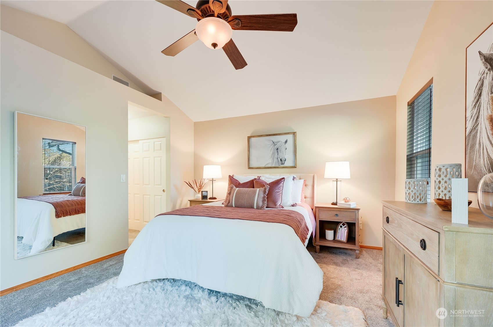 2201 192nd Street Southeast, Unit C3 Bothell, WA 98012 - Photo 15 of 26 a spacious bedroom with a bed and a window