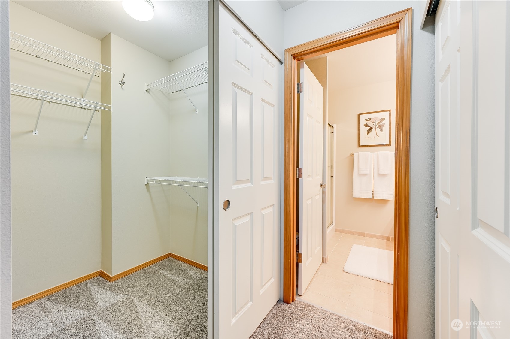 2201 192nd Street Southeast, Unit C3 Bothell, WA 98012 - Photo 16 of 26 a view of a bathroom with a shower and a door