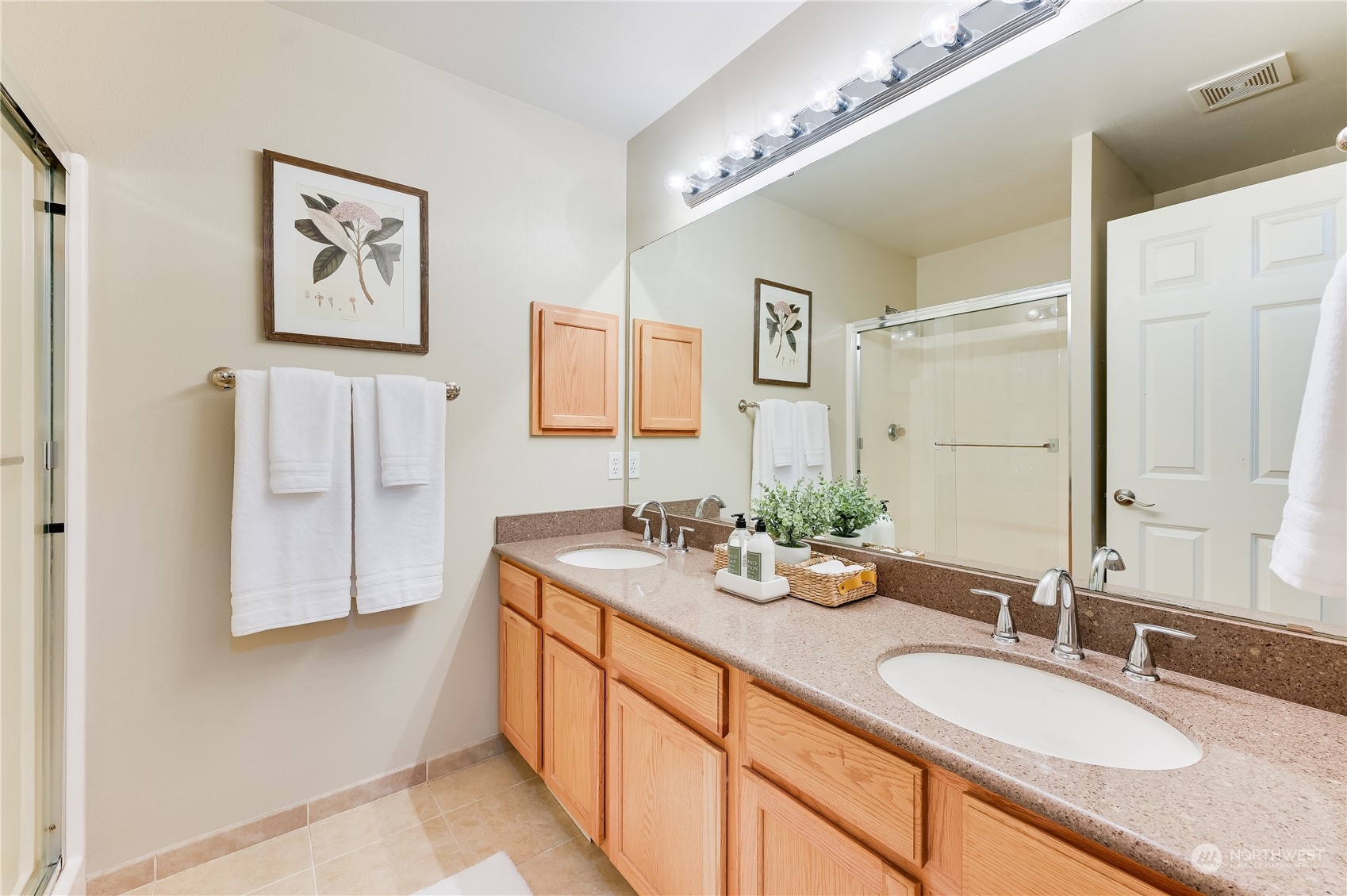 2201 192nd Street Southeast, Unit C3 Bothell, WA 98012 - Photo 17 of 26 a bathroom with a double vanity sink and a mirror