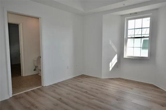 a bathroom with 2 sink and a mirror