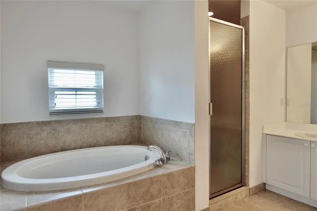 a swimming pool with outdoor seating and yard