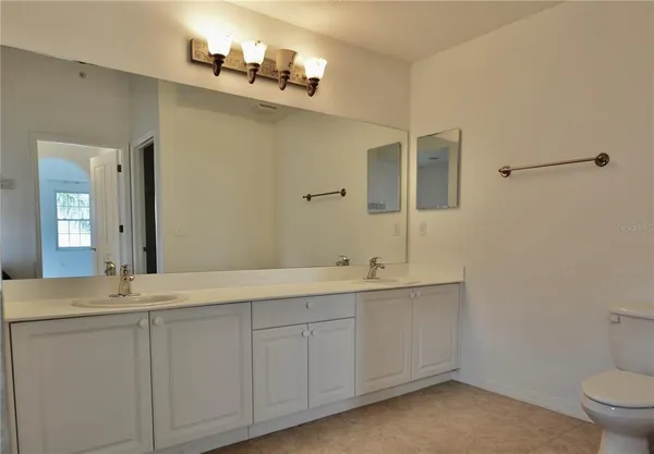 a view of a garden with a patio