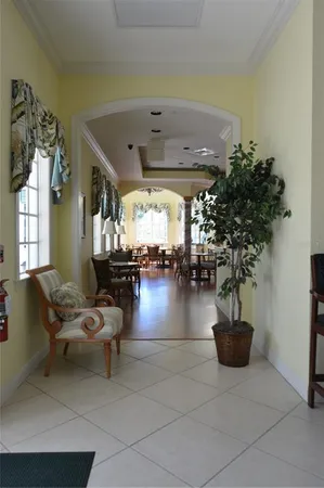 a room with a mirror and a window