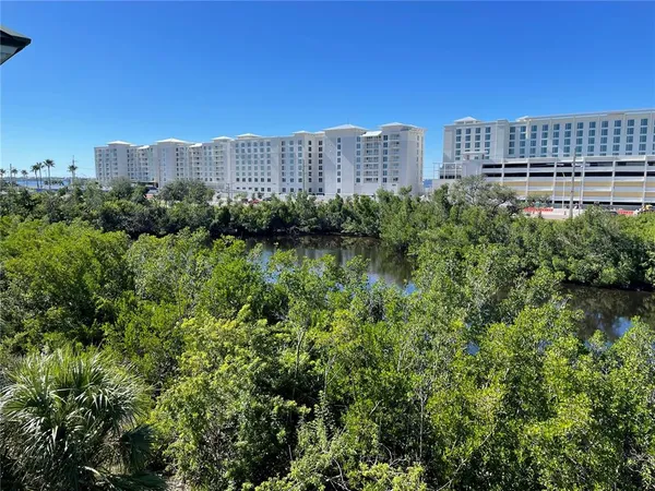 an empty room with windows and a window
