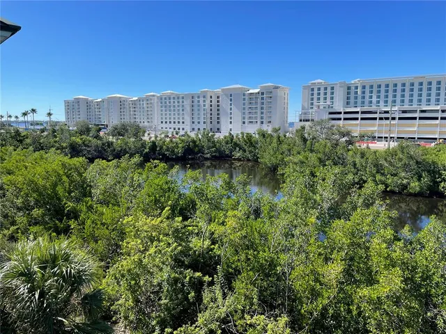 an empty room with windows and a window