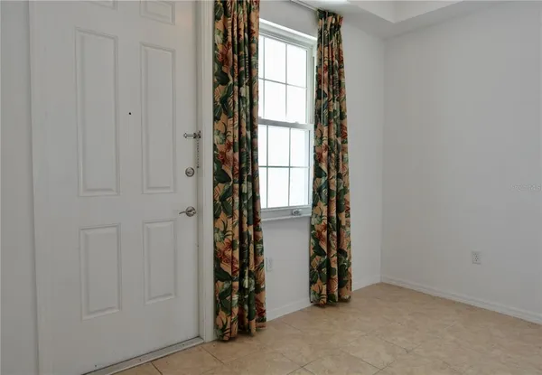 a bathroom with a toilet and a bathtub
