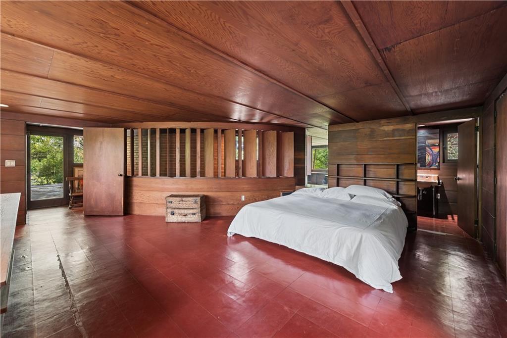 5139 Penton Road Pittsburgh, PA 15213 - Photo 25 of 32 a spacious bedroom with a large bed and a wooden roof