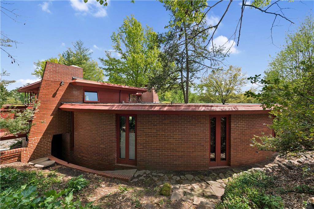 5139 Penton Road Pittsburgh, PA 15213 - Photo 28 of 32 front view of a house with a tree