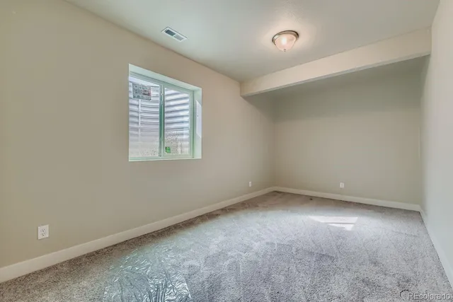 an empty room with a window