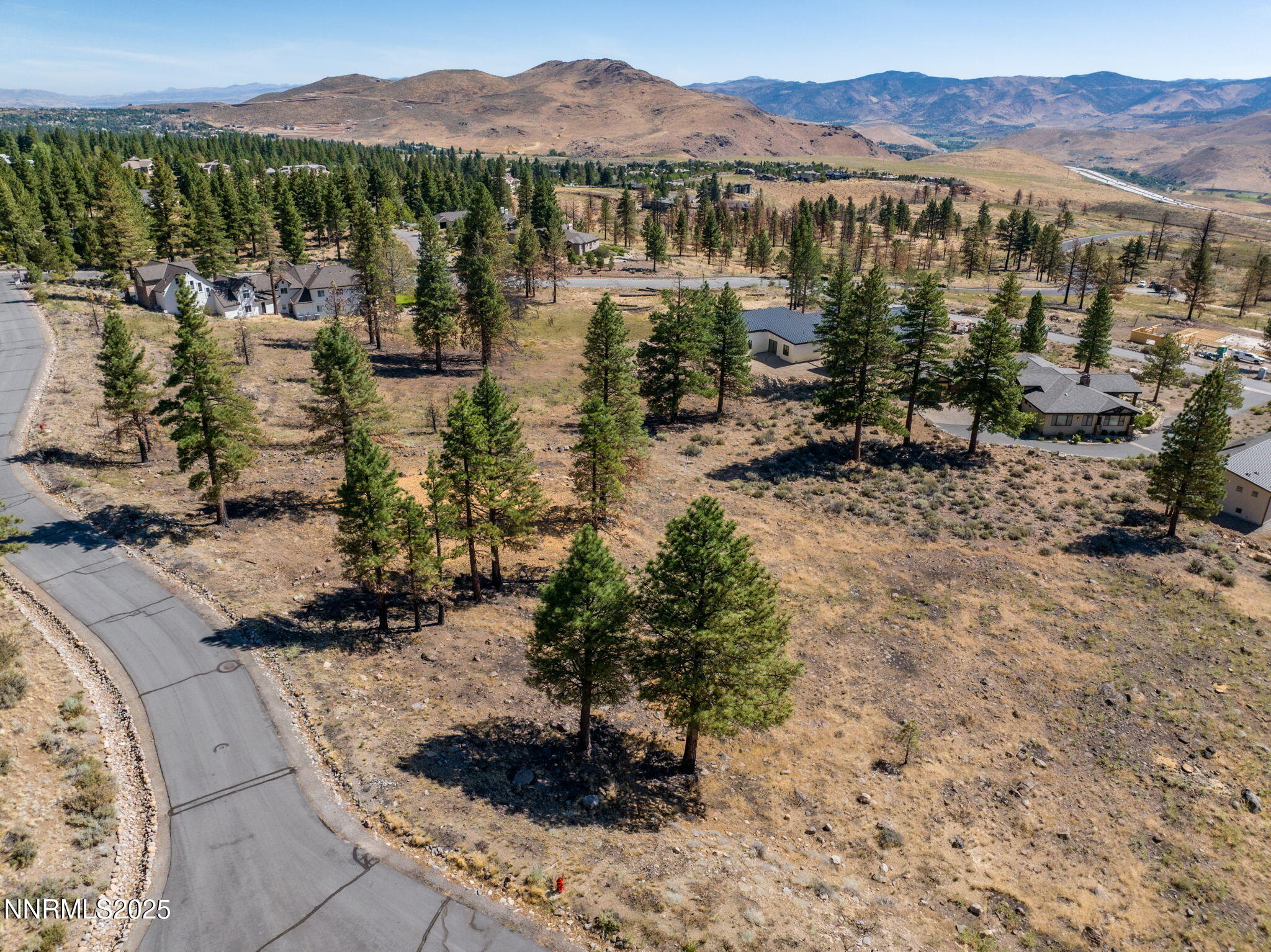 485 Mt Mahogany Court Reno, NV 89511 - Photo 21 of 28 a view of a lake with a mountain in the background