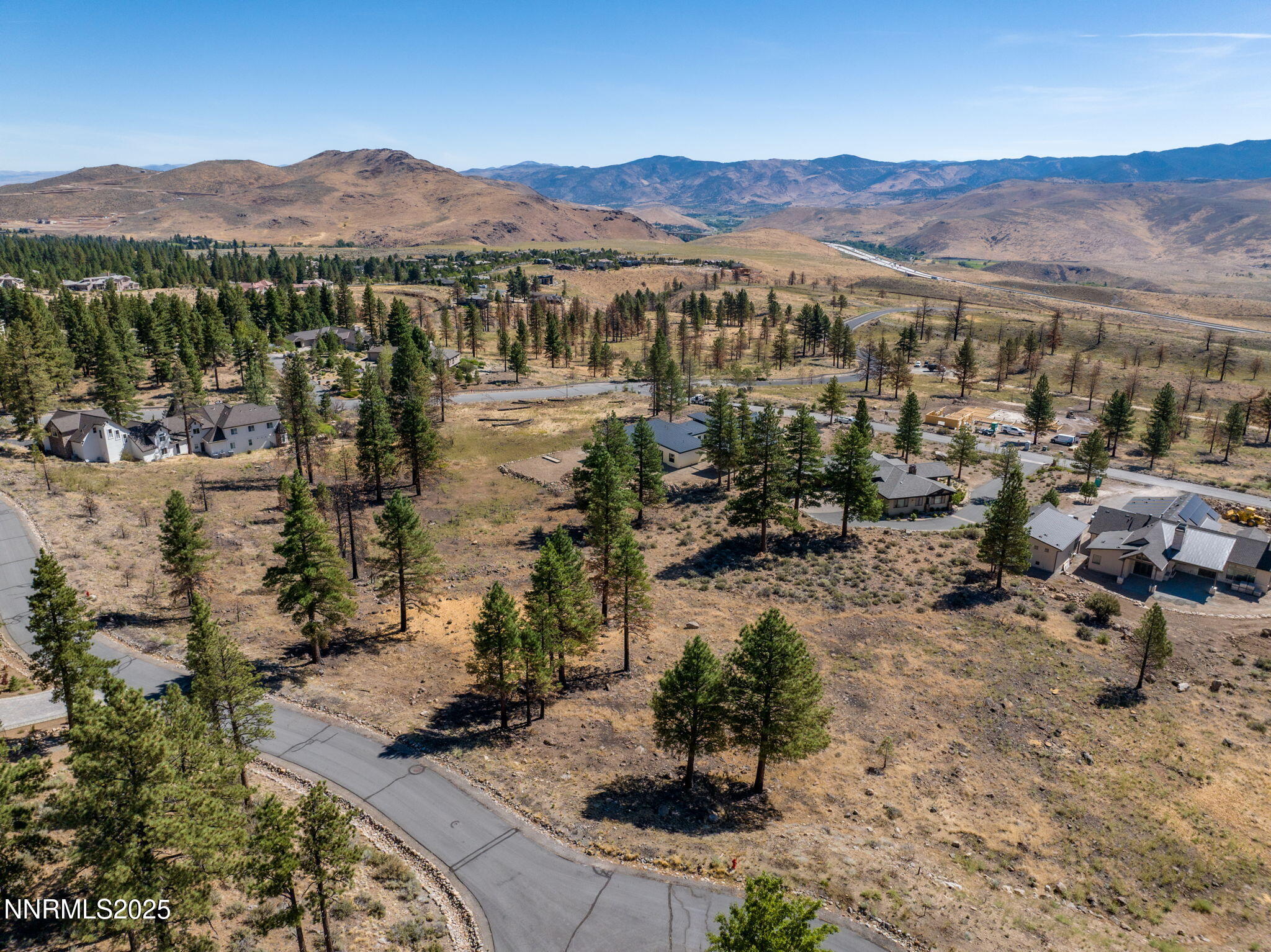485 Mt Mahogany Court Reno, NV 89511 - Photo 9 of 28 a view of a lake with mountains in the background