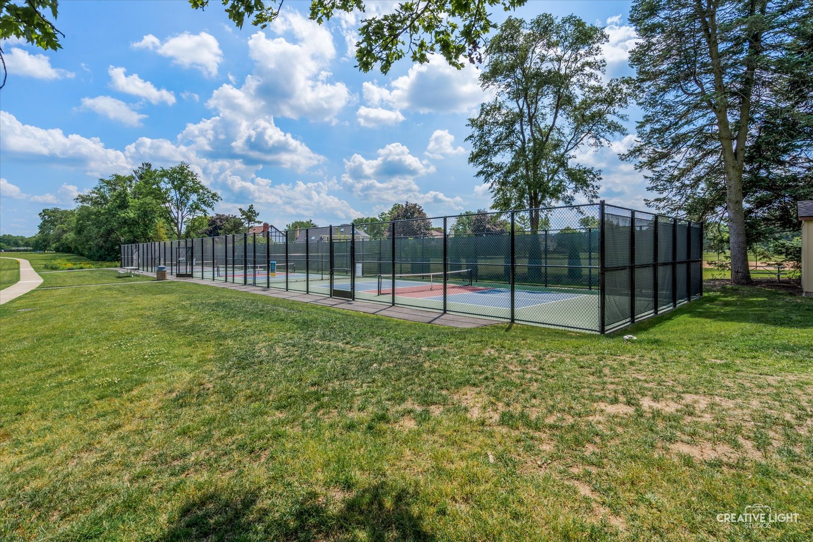 1703 Lakecliffe Drive, Unit D Wheaton, IL 60189 - Photo 20 of 20 a view of a garden