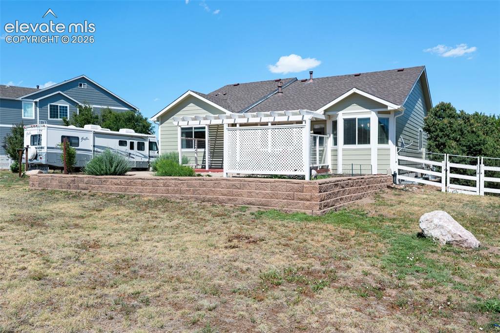 7840 Midnight Road Peyton, CO 80831 - Photo 42 of 48 There's lots of room for gardening, an RV, or other outdoor toys